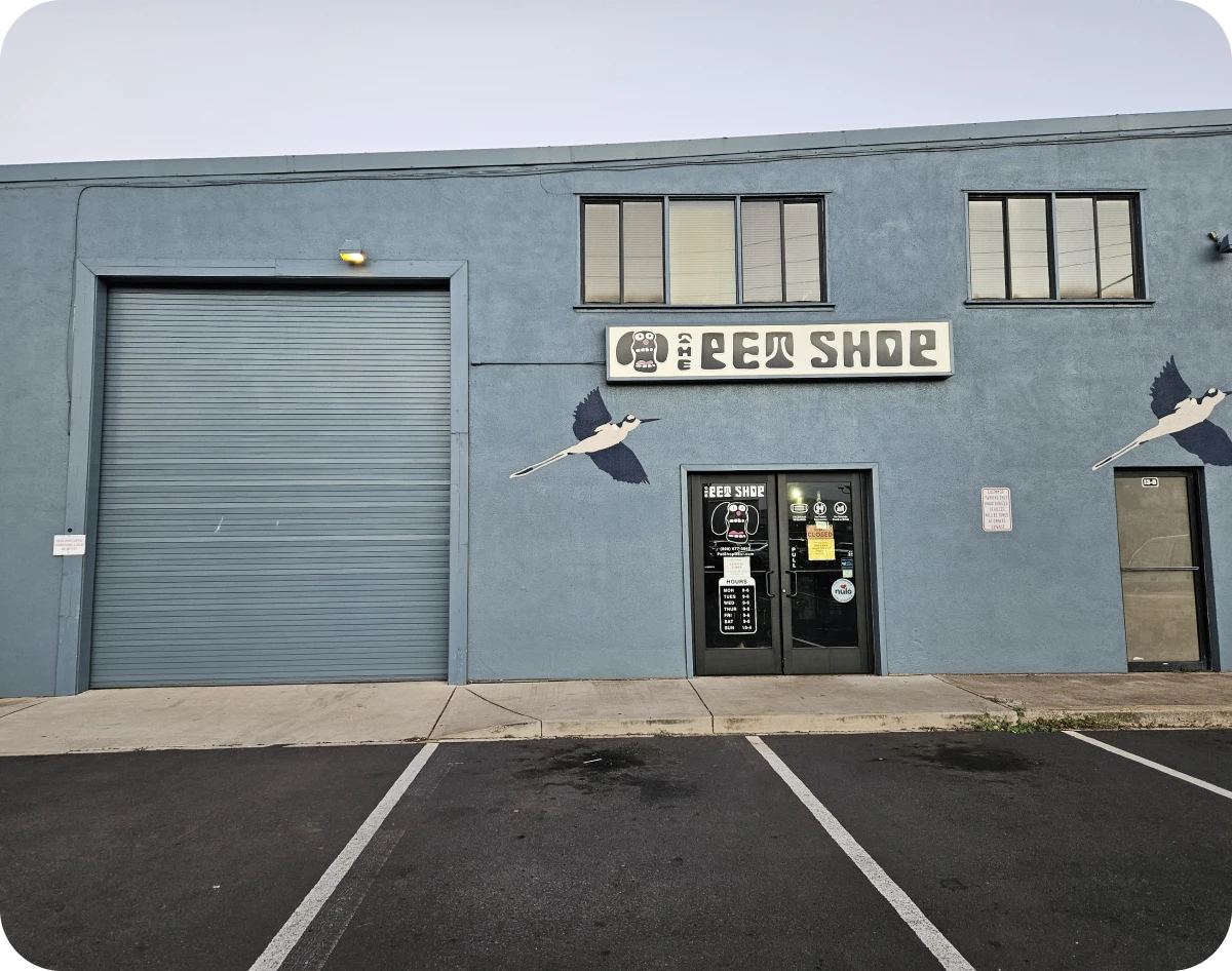 Industrial building entrance with parking lot